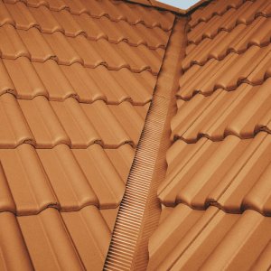 Dachy sko��ne - Systemowe  rozwiązania - gwarancją  bezpiecznego dachu na długie lata.